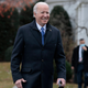 U.S. President Joe Biden walks over to reporters while departing the White House on December 8, 2021 in Washington, D.C.